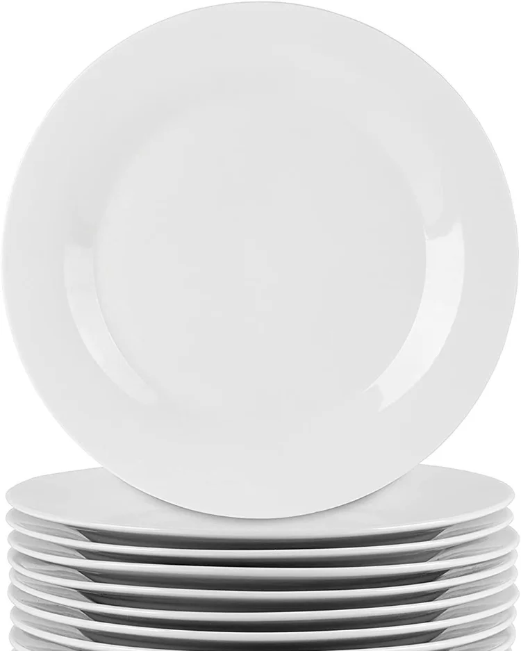 Stack of basic white salad and appetizer plates.