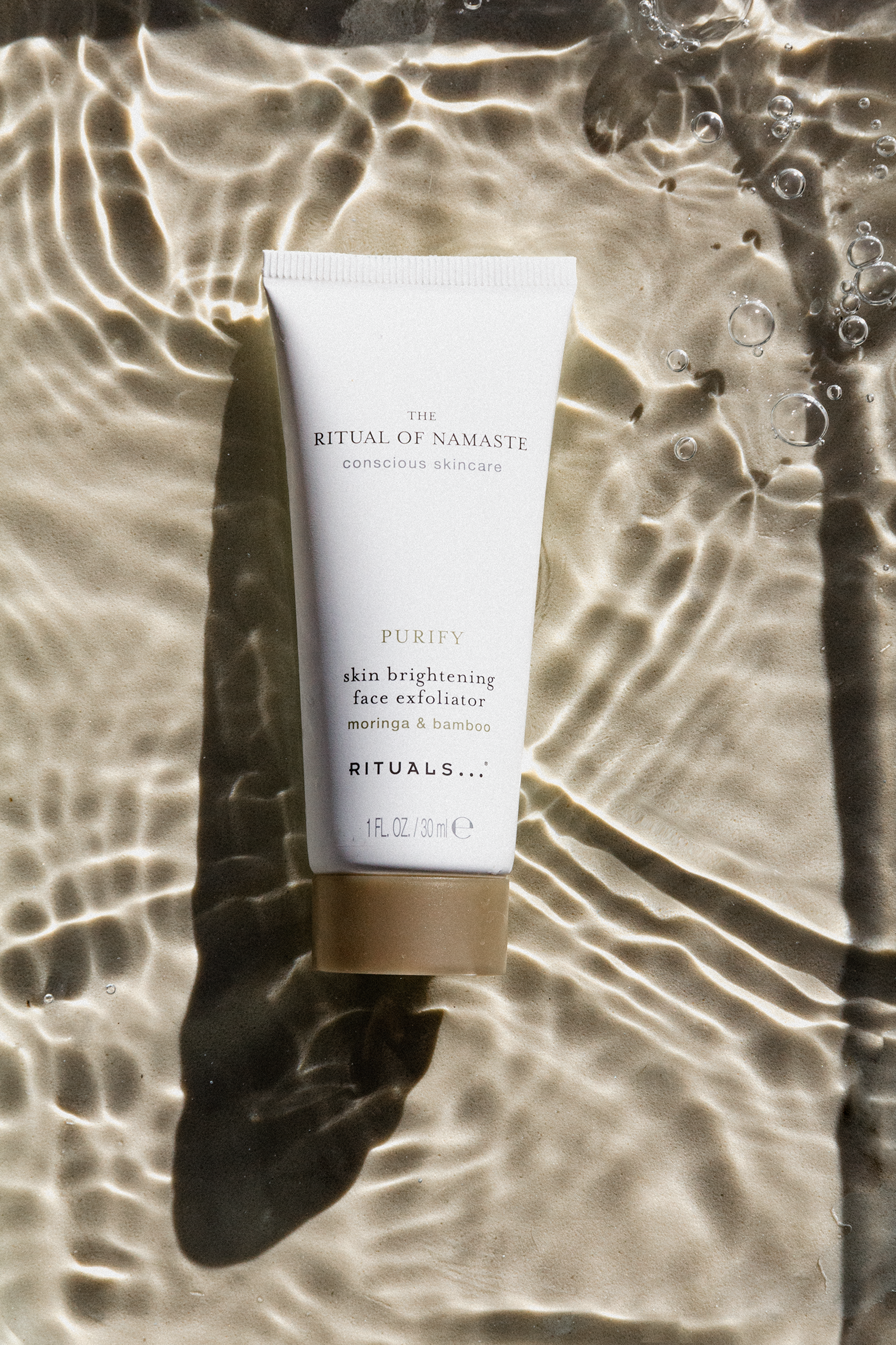 
Skincare product photography with water effects 