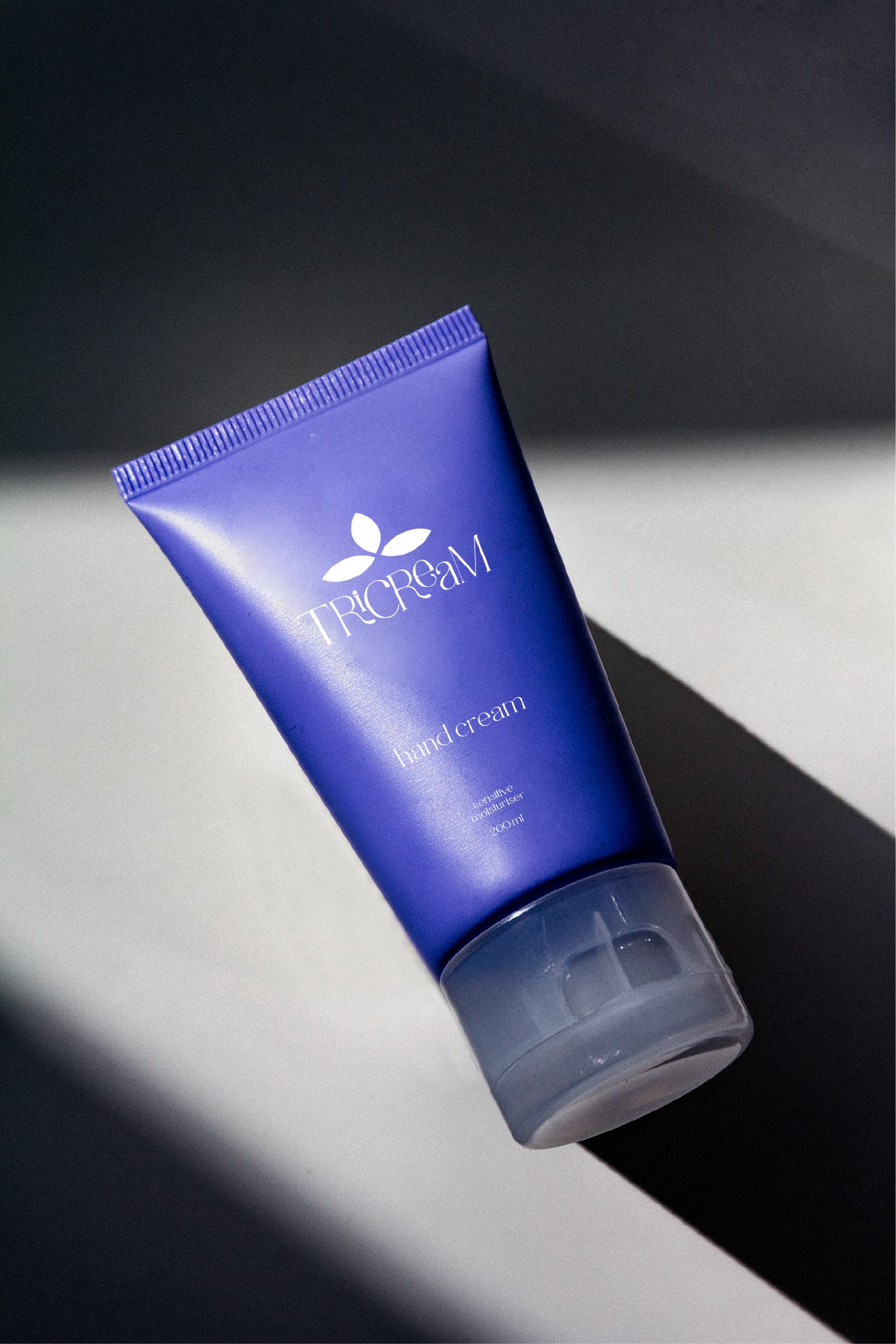 tricream brand purple packaging design 