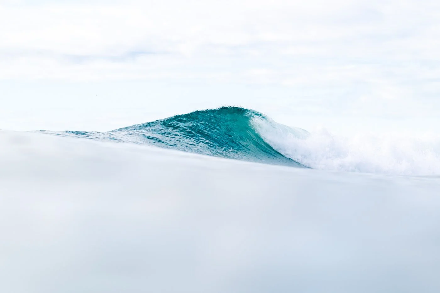 mid-range surf photography example showing wave crest detail using 80mm lens perspective