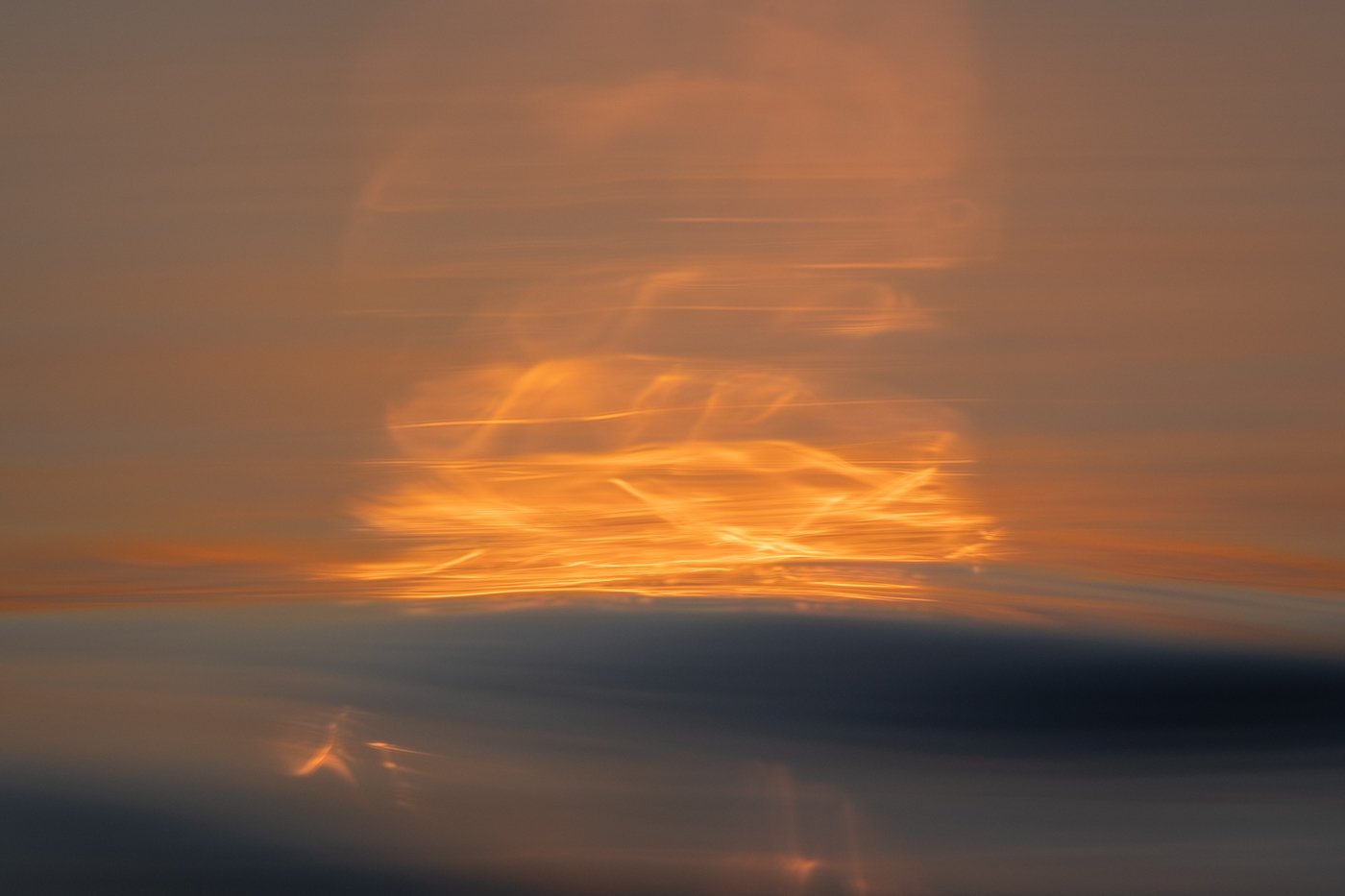 sunrise ocean layers photographed with mid-range focal length water photography lens