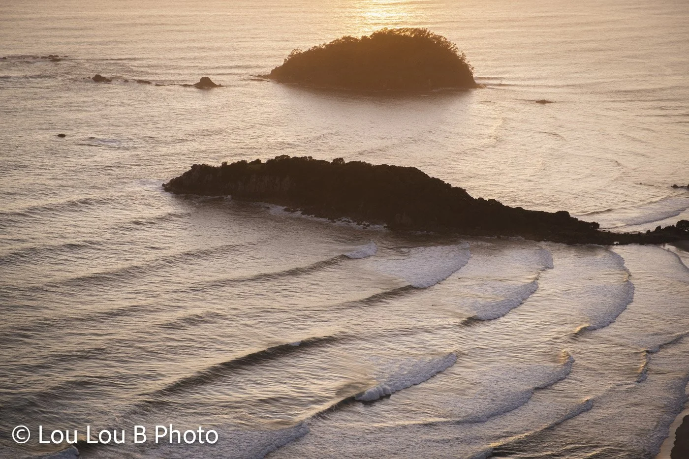 Moturiki Island and Motuotau Island off Mount Maunganui in warm golden coastal light