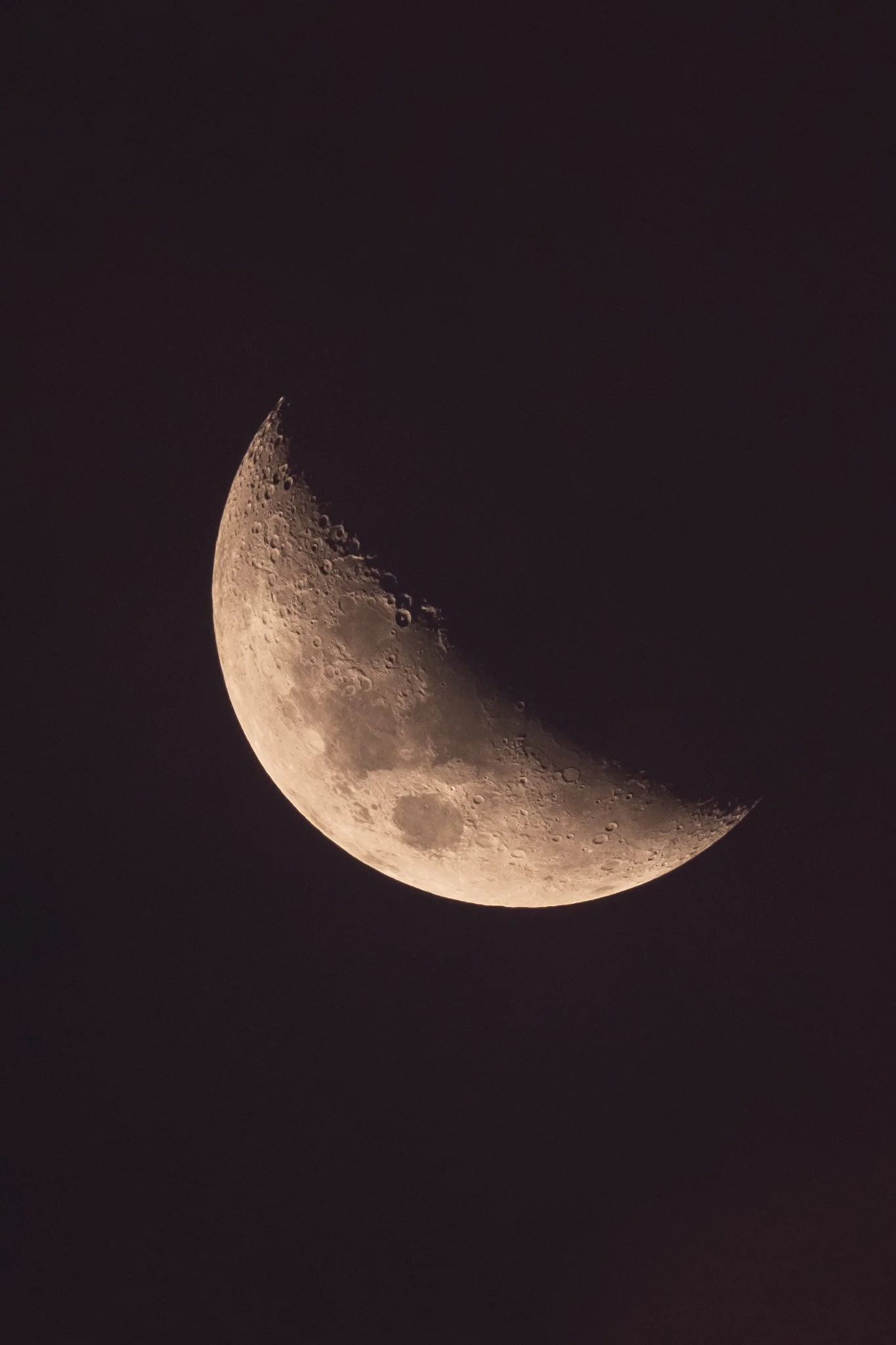 Close up photo of waxing crescent moon by New Zealand photographer Lou Lou B Photo