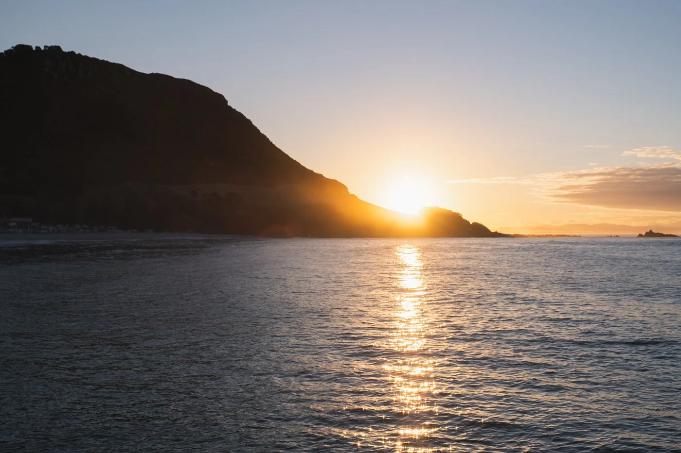 Winter sunset alignment beside Mauao from Moturiki Island Mount Maunganui