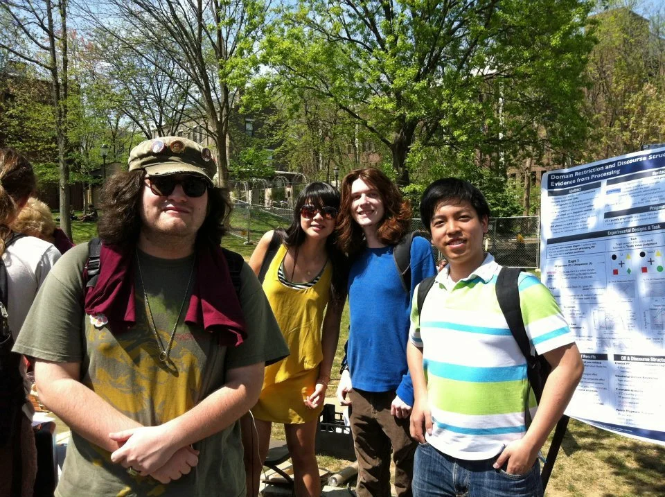 In front of a linguistics poster