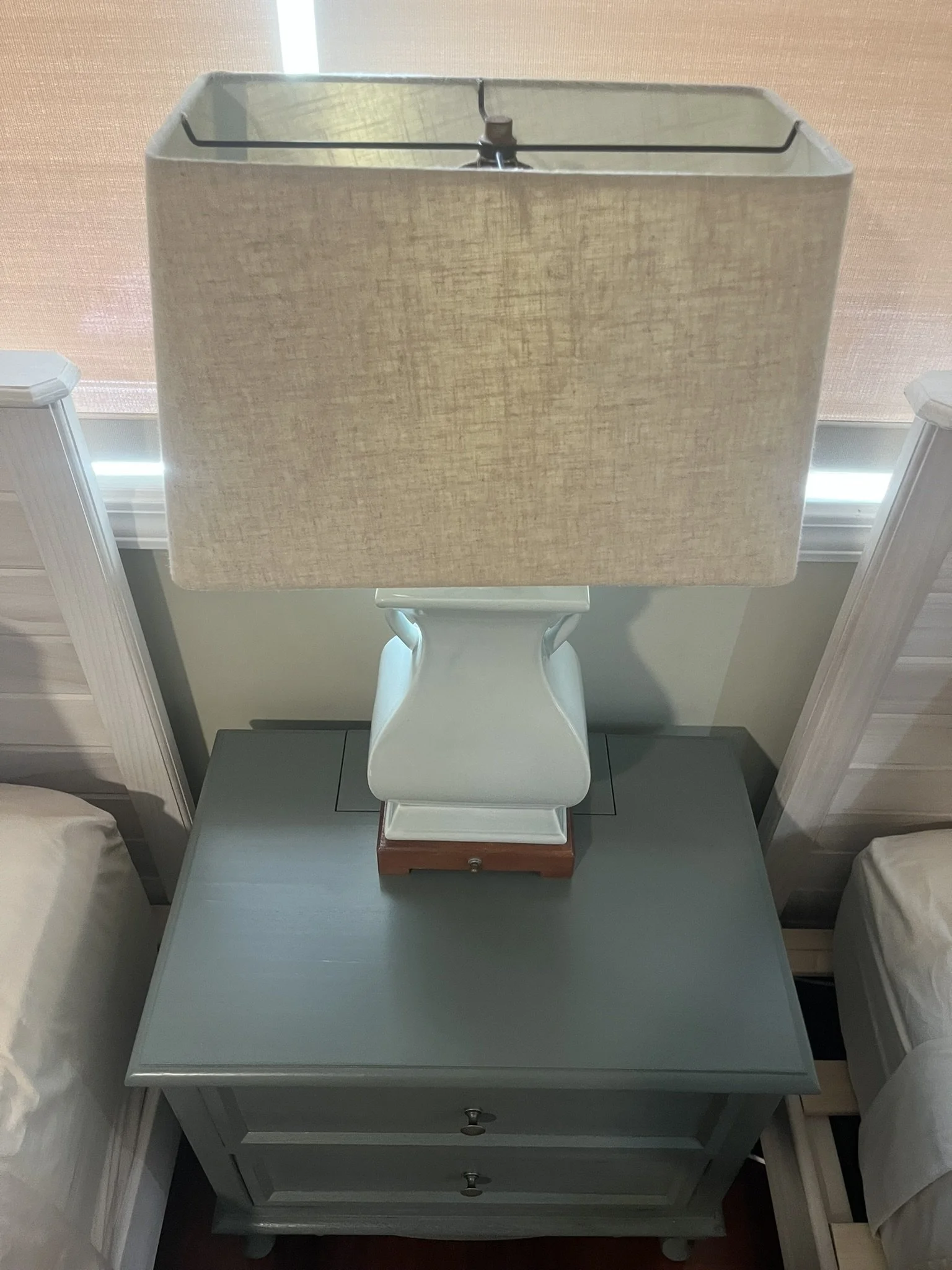 Furniture refinishing in a Maui home - gray nightstand with drawer and lamp, by Maui Home Refinishing.