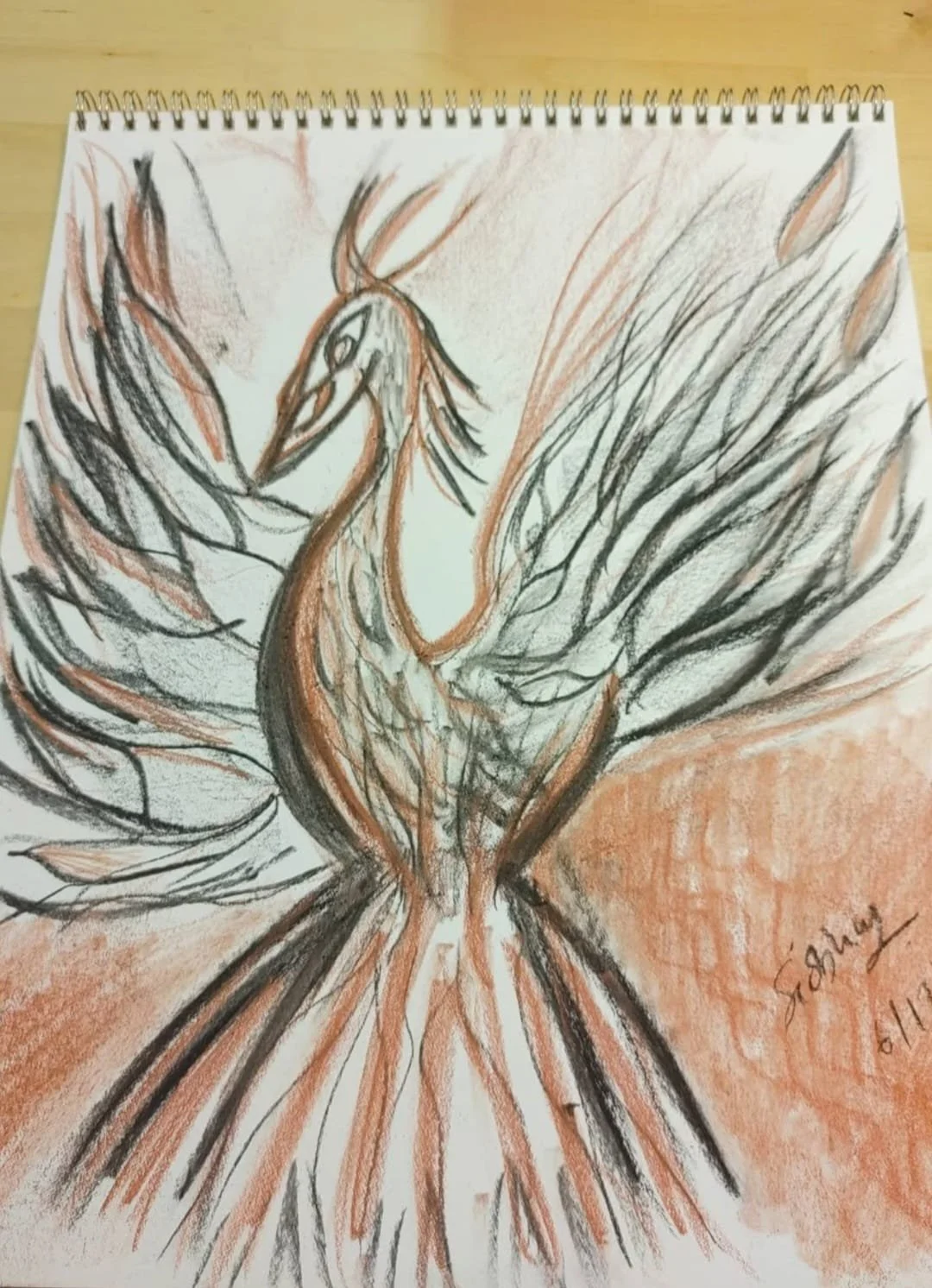 Charcoal drawing of a phoenix-like bird with wings outstretched, created in 2021.