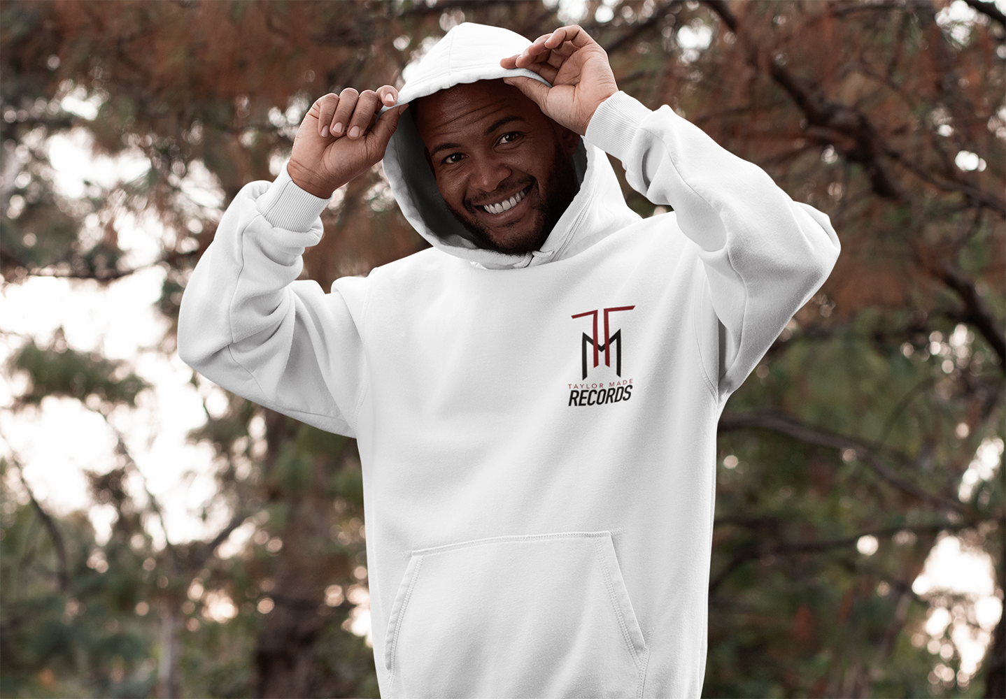 hoodie-pullover-mockup-featuring-a-joyful-man-in-the-woods-30306.png