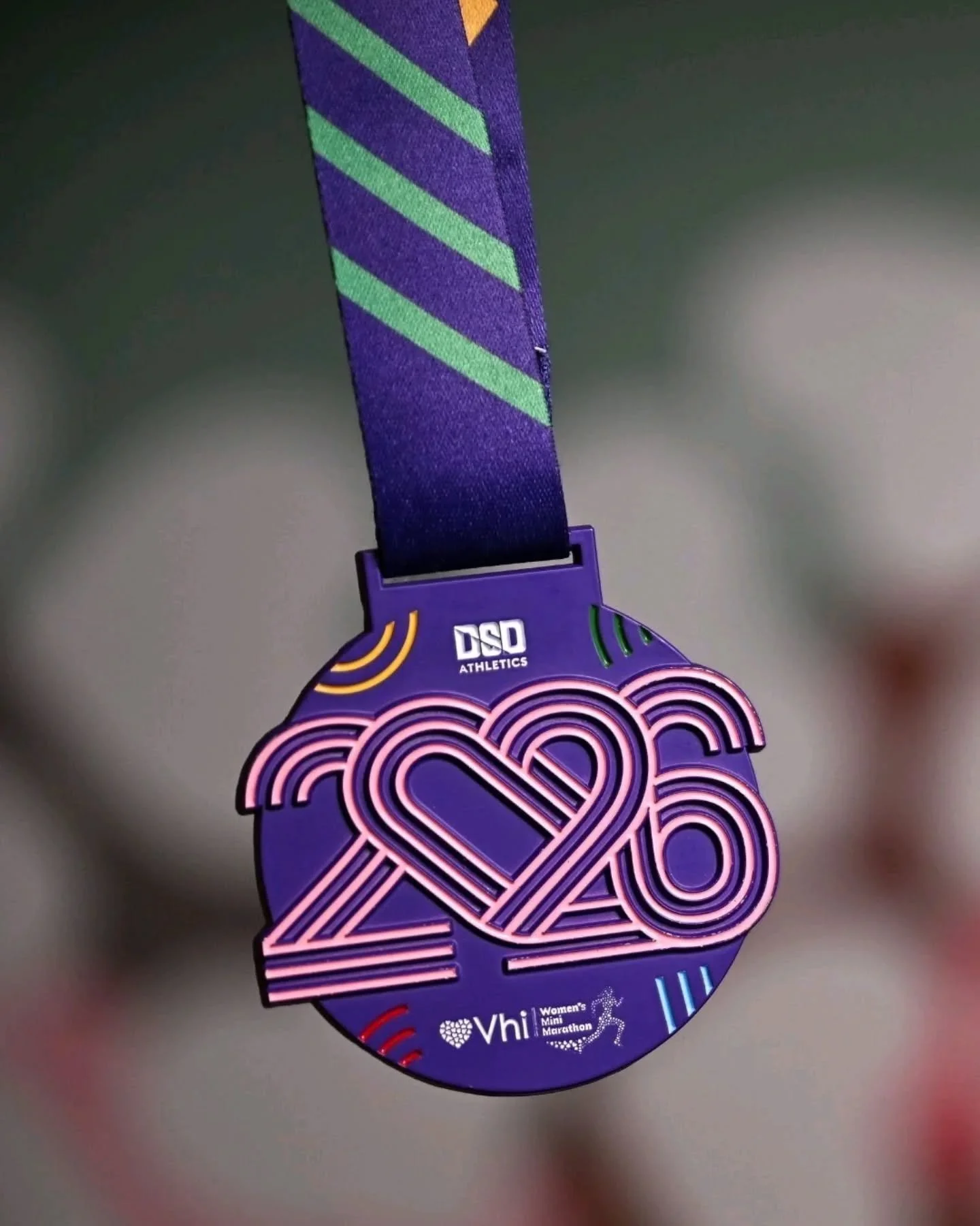 Meet your 2026 finisher's medal 💜 

Introducing 'Heartbeat' - the official medal for this year's Vhi Women's Mini Marathon, designed by Se&aacute;n Cotter.

The numerals 2026 overlap to form a heart at the centre, with three lines weaving through to