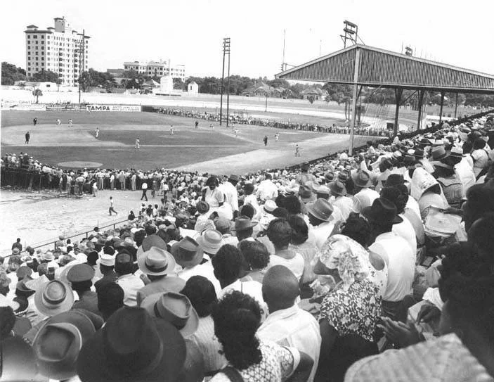 Vintage black-and-white photograph of 1954 baseball spring training representing archival primary source research for writing a sports biography.