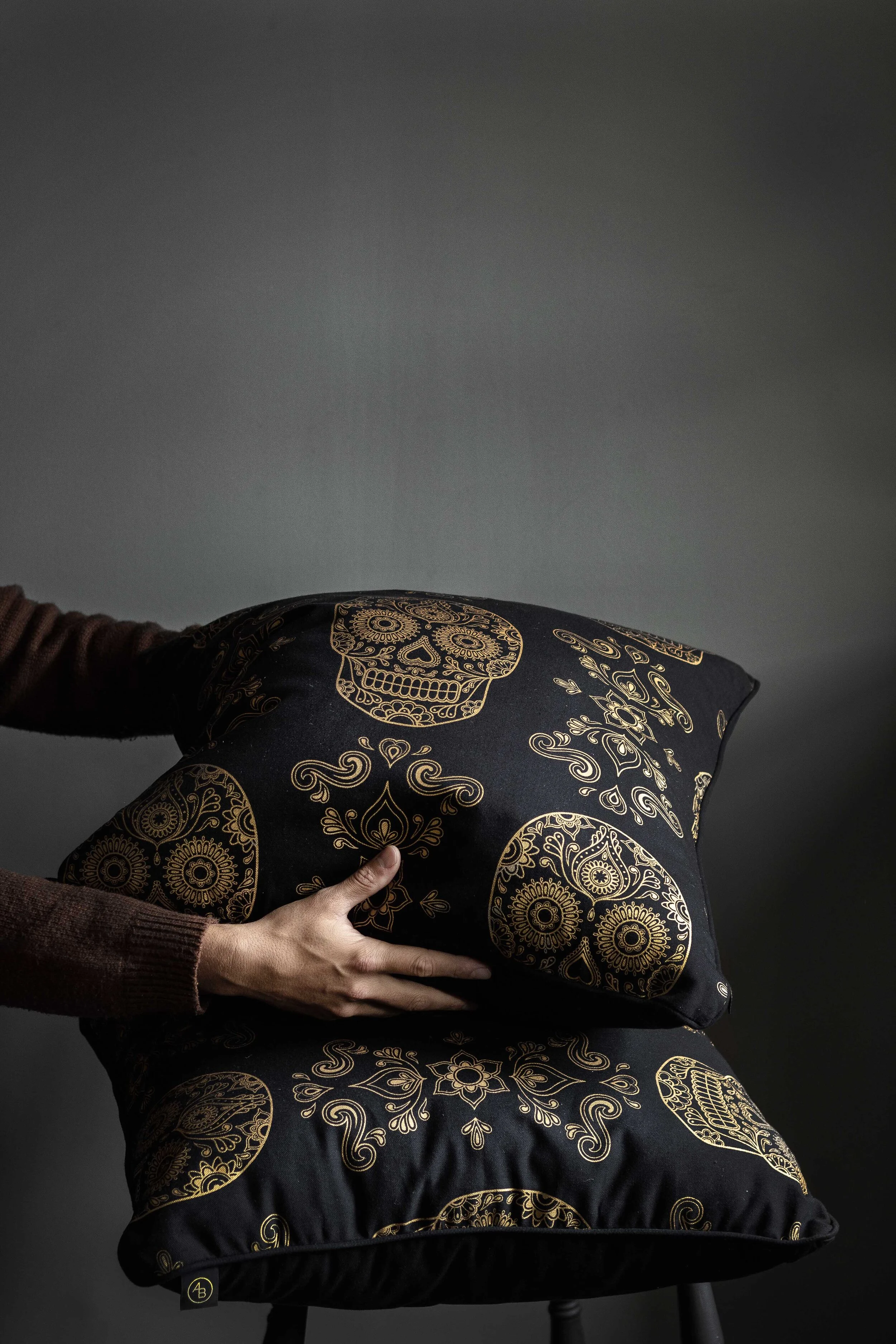 Skull Cusion Hands.jpg