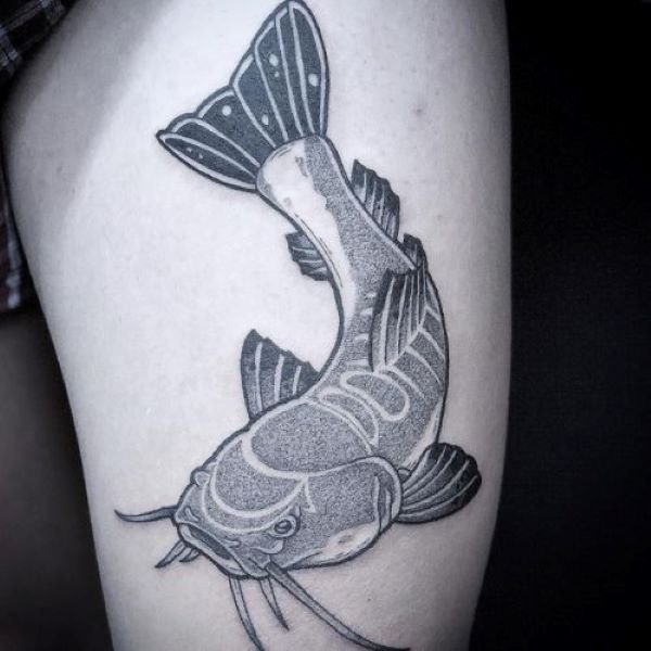 Black and white tattoo of a redtail catfish