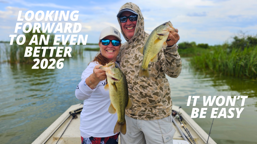 Couple holding up largemouth bass at Grosse Savanne Louisiana