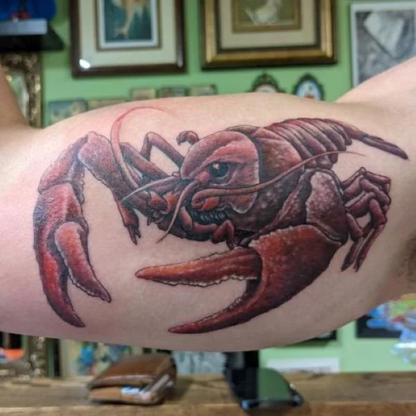 Bright red fierce crawfish tattoo
