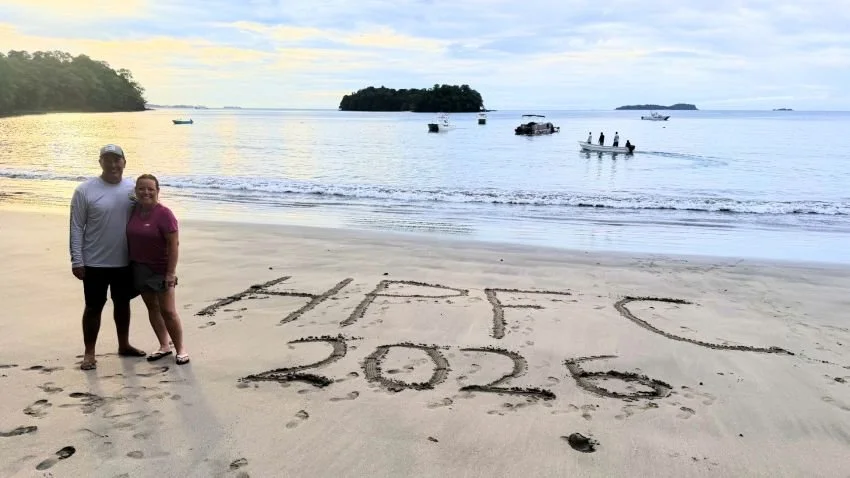 Couple standing on a beach on Isla Paridas Panama Chiriqui