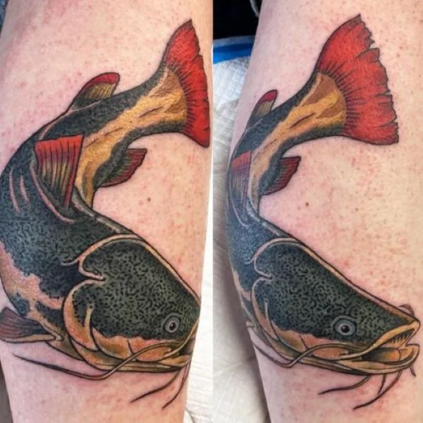 Colorful very realistic redtail catfish tattoo