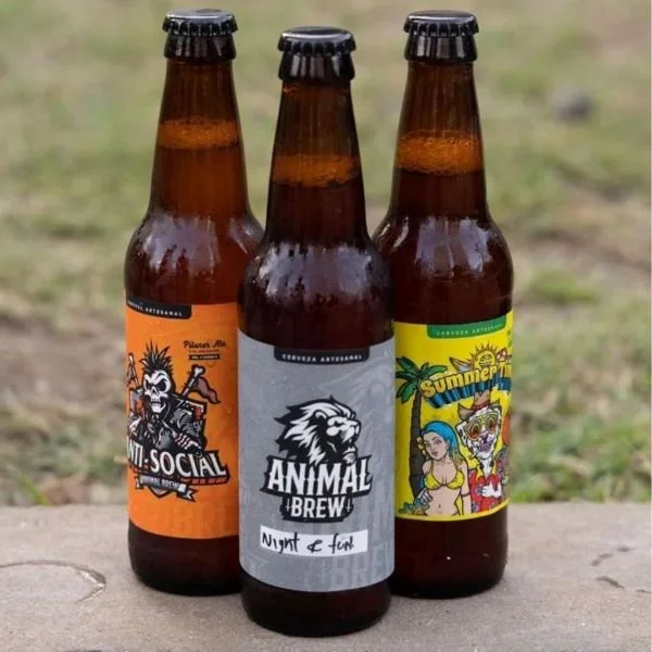 Three bottles of Animal Brew craft beer from Panama