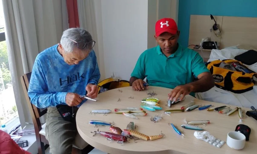 Changing out terminal tackle before an Amazon Basin fishing trip