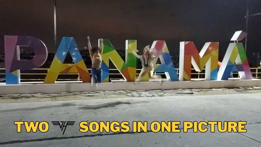 Leaping off the colorful Panama sign in Panama City