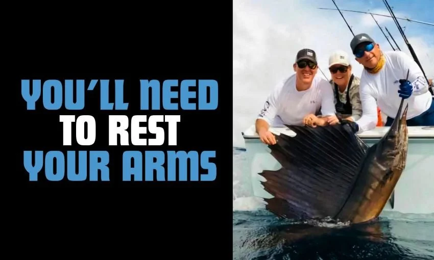 hoisting a big sailfish boatside in Guatemalan Pacific Ocean