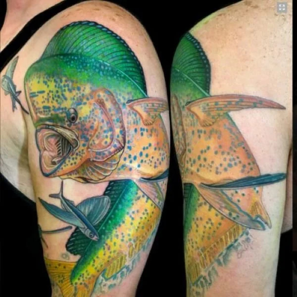 arm tattoo of leaping mahi chasing multiple flying fish to eat