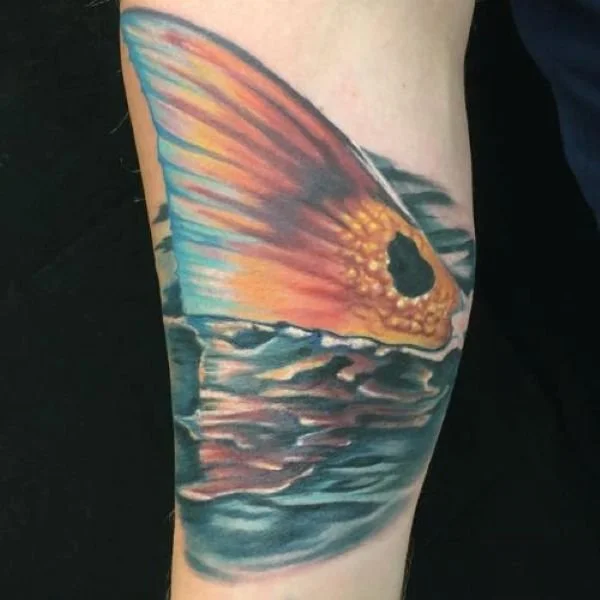 bright red redfish tail tattoo