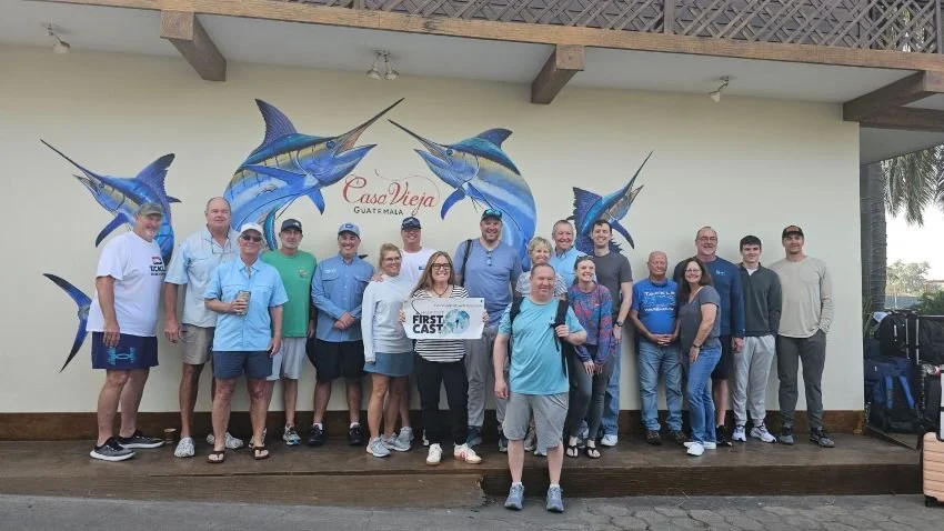 Anglers in front of Carey Chen mural at Casa Vieja Lodge Guatemala