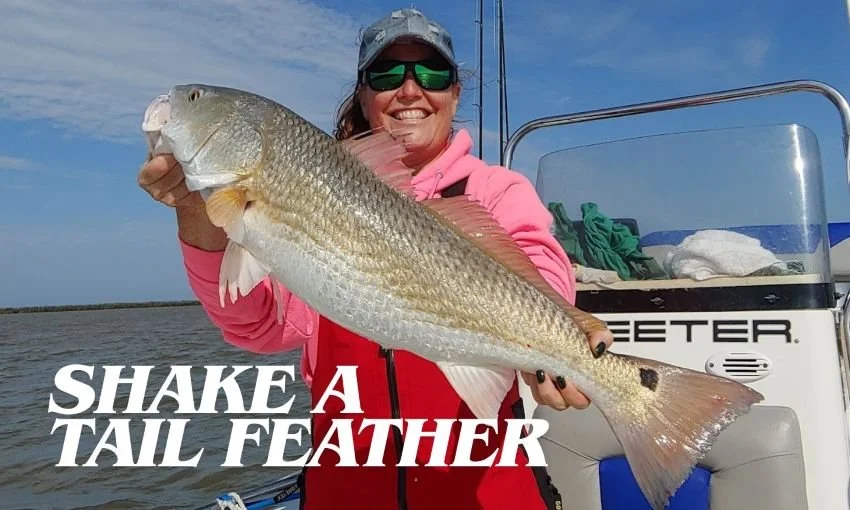 Hanna Robbins with bull redfish caught in Venice Louisiana on a Skeeter Boat