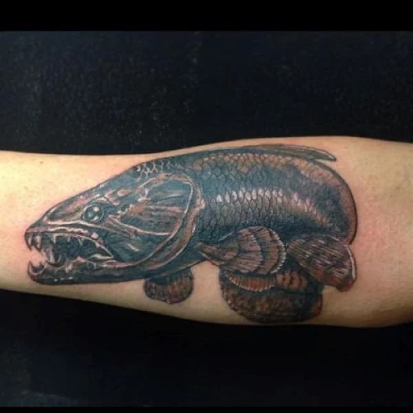 black and white leaping trairao tattoo