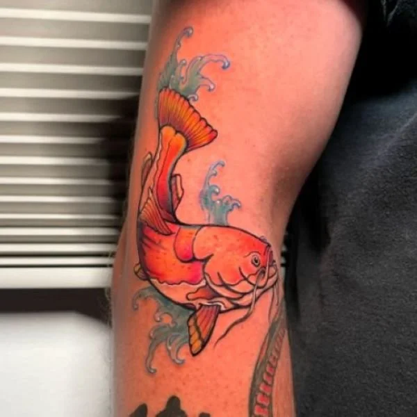 Redtail catfish tattoo arm shoulder