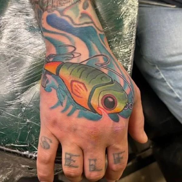 Matt Crowe Art firetiger tattoo on a hand