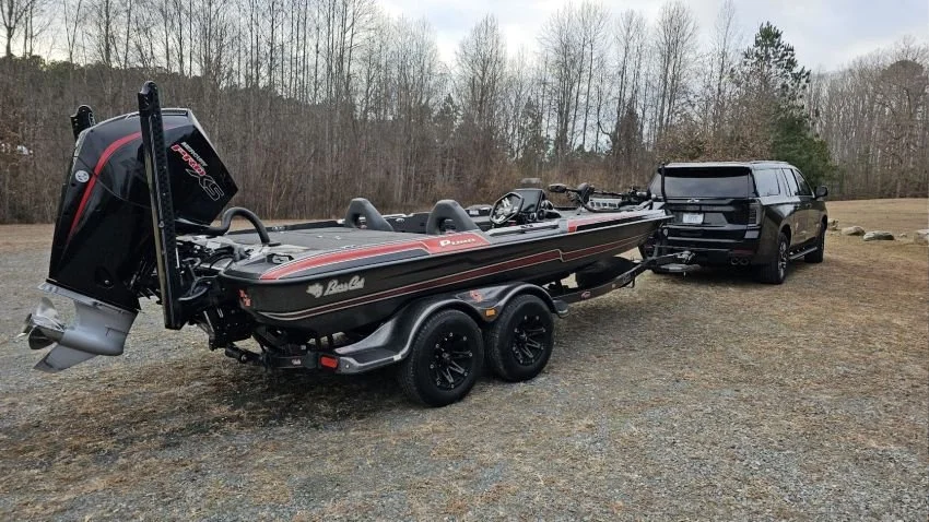 Chevrolet Suburban towing a Bass Cat Puma STS