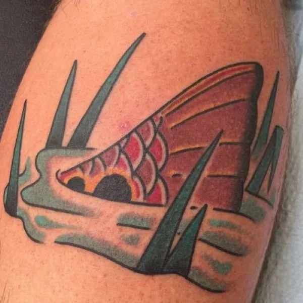 Galactic Tattoo tail of a redfish surrounded by reeds