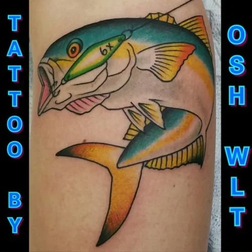 color tattoo of a yellowtail eating a 6X iron lure