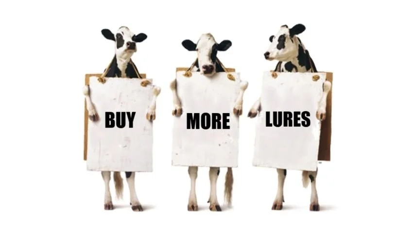 Chik Fil A Cows with Boards that say Buy More Lures