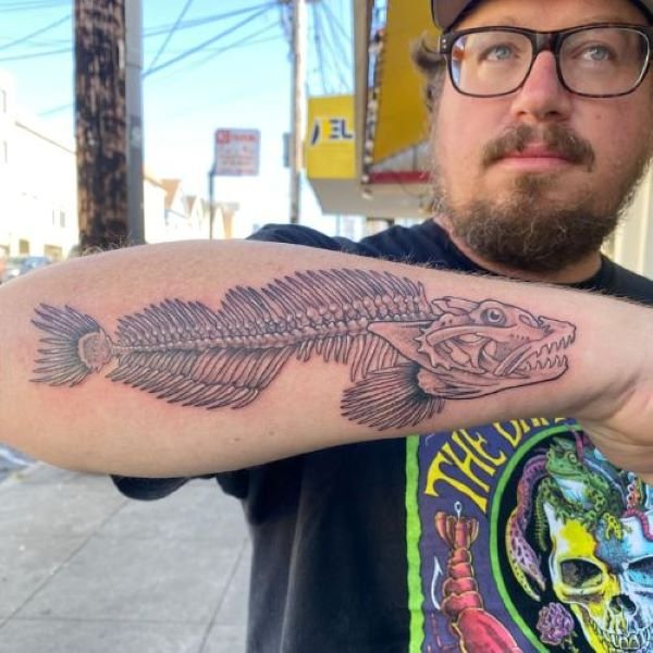lingcod skeleton tattoo forearm