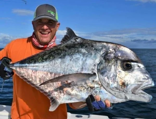 Capt. Shane Jarvis with a trophy African Pompano