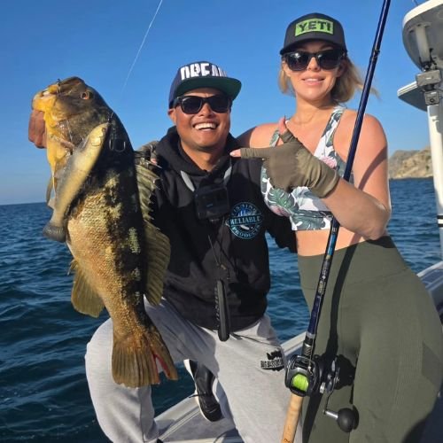 Oliver and Riley Ngy with trophy calico bass caught on Defiant Swimbait