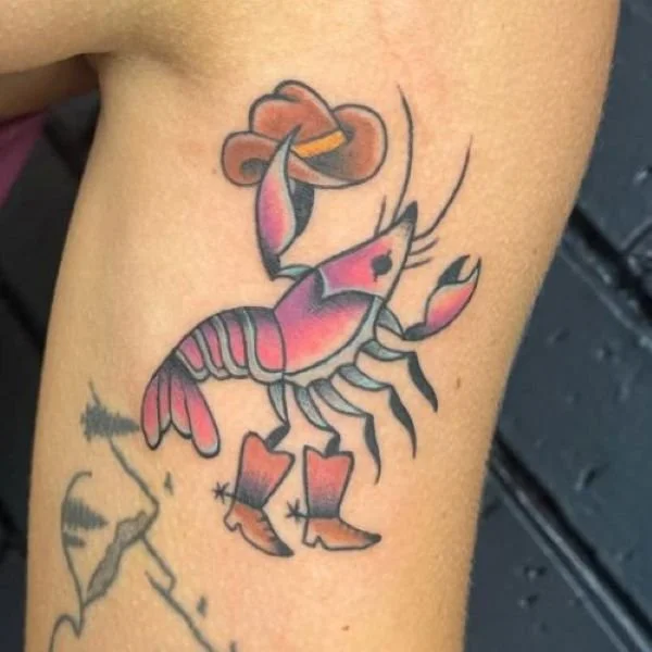Cowgirl crawfish tattoo