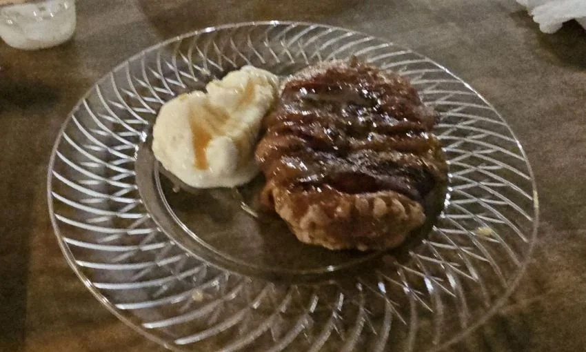 deep fried honey bun wrapped in bacon with vanilla ice cream