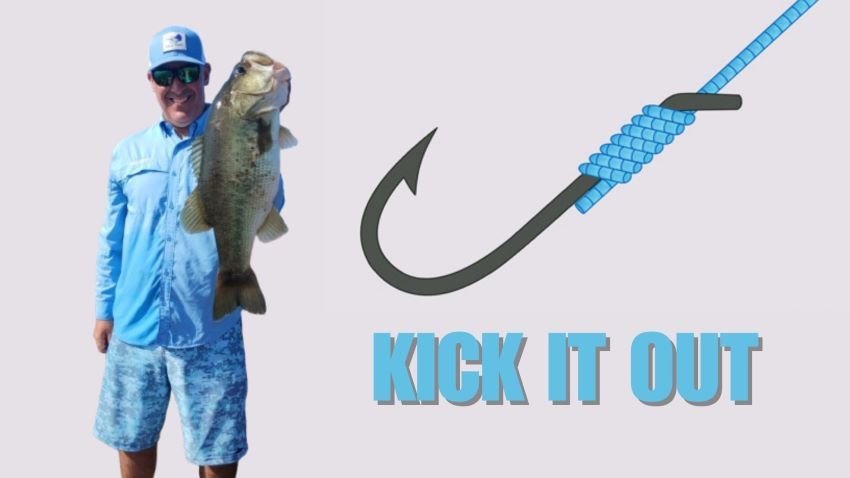 Angler holding up big largemouth bass caught with flipping stick using snell knot