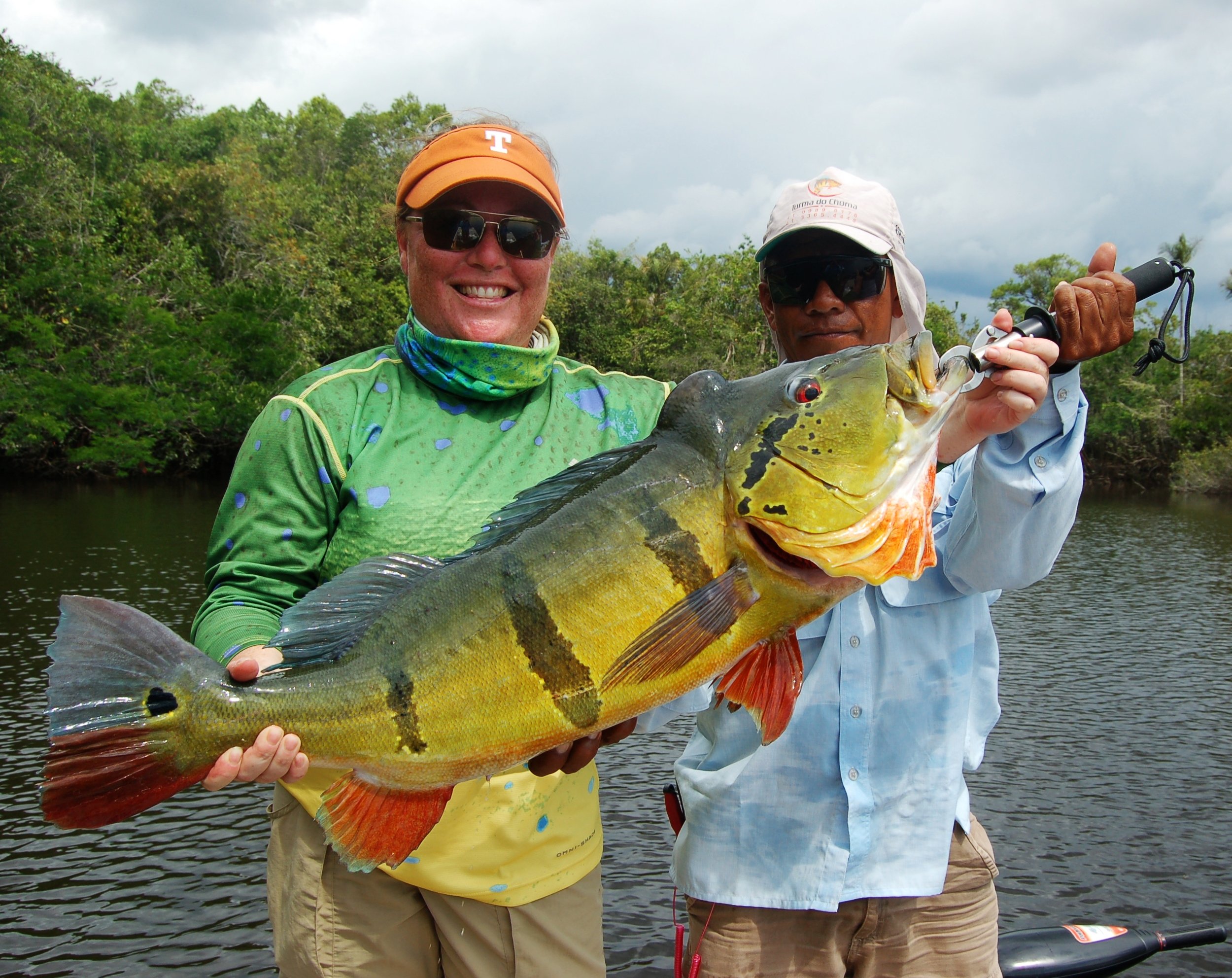Hanna Robbins with trophy Rio Negro peacock bass