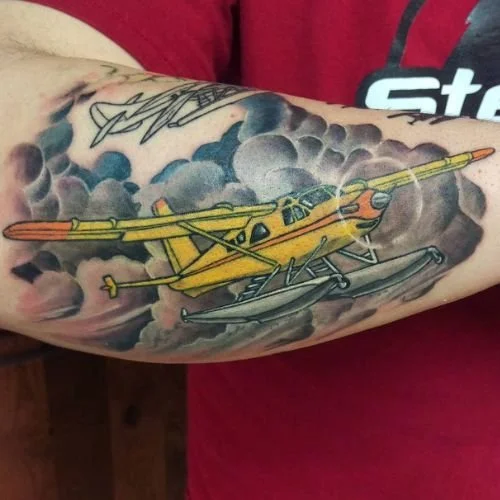 Yellow De Havilland float plane tattoo