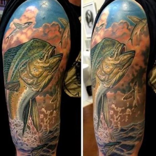 colorful realistic tattoo of dolphin fish chasing flying fish