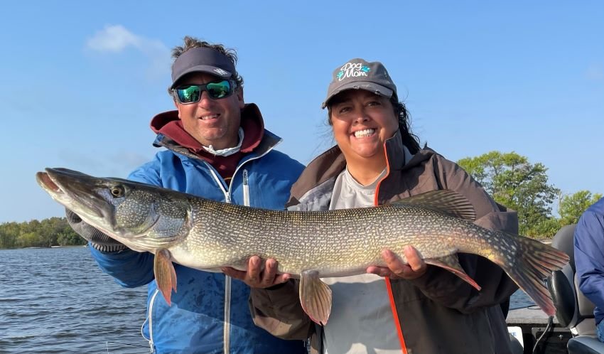 Lady angler Lisa Skelley of Tennessee with a trophy Canadian Northern Pike