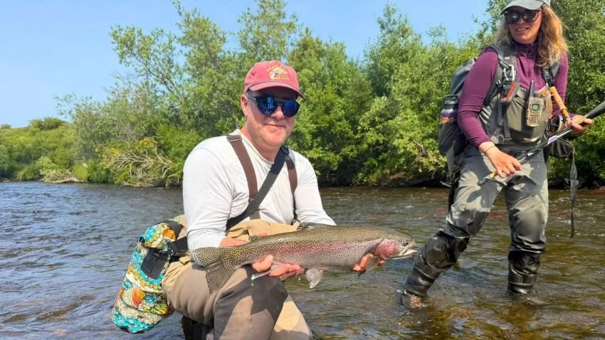Adam Cherry with trophy rainbow trout Alaska August