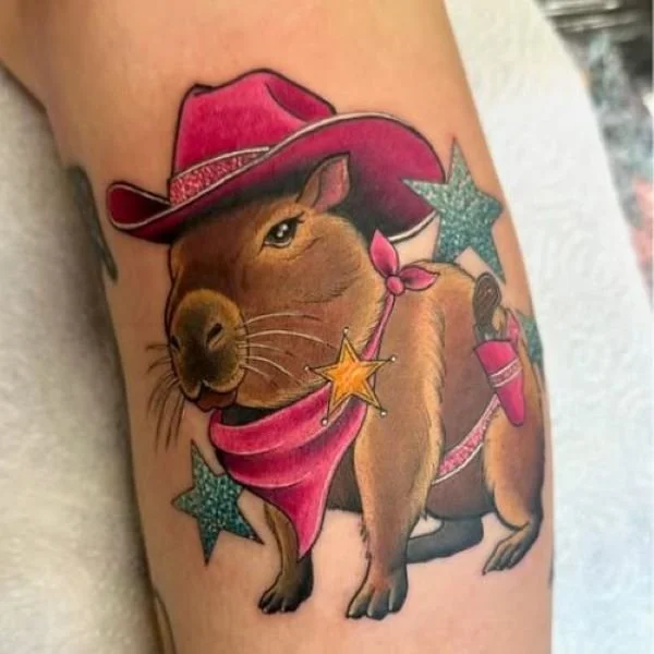 Color Tattoo of a capybara in a cowboy hat