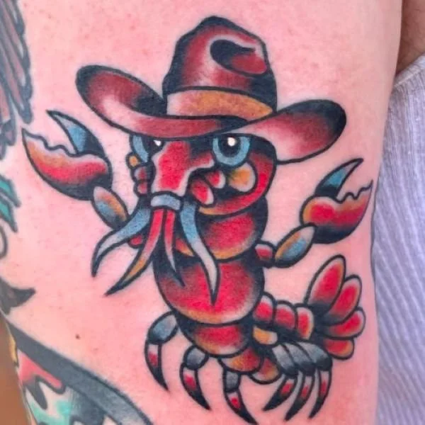 Bright Red Crawfish Cowboy Tattoo