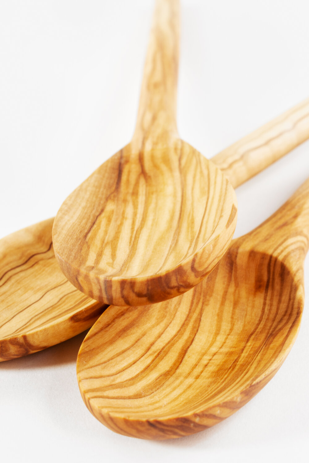 https://images.squarespace-cdn.com/content/v1/5e29c5be77311200d3bb400e/1626365927379-57BEVZWL9NDHXWYWEWPG/Olive_Wood_Cooking_Spoon_2.jpg?format=1000w