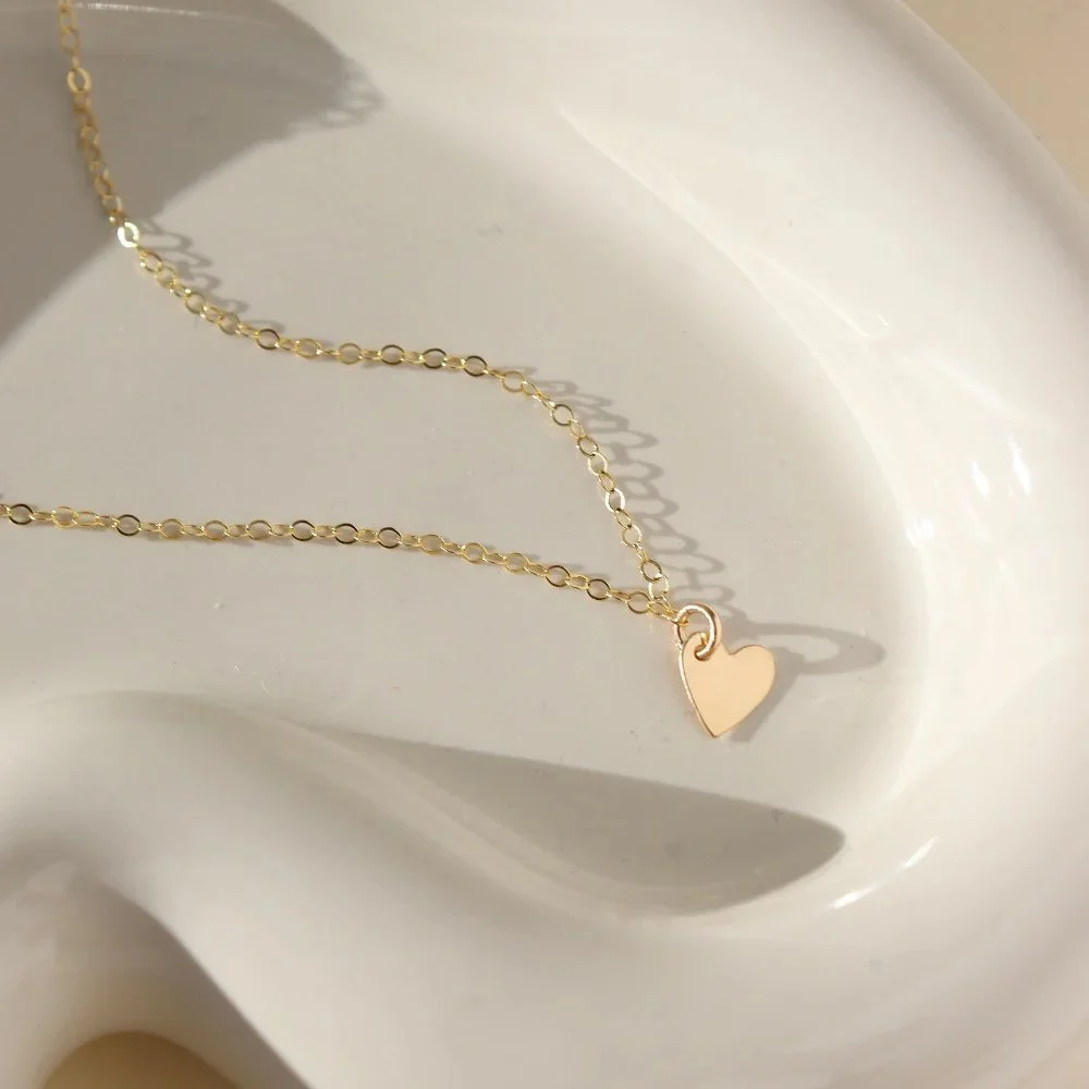 2 Lennon Heart Necklace in Gold.jpg